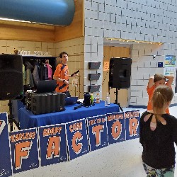 Apex team member at the DJ booth